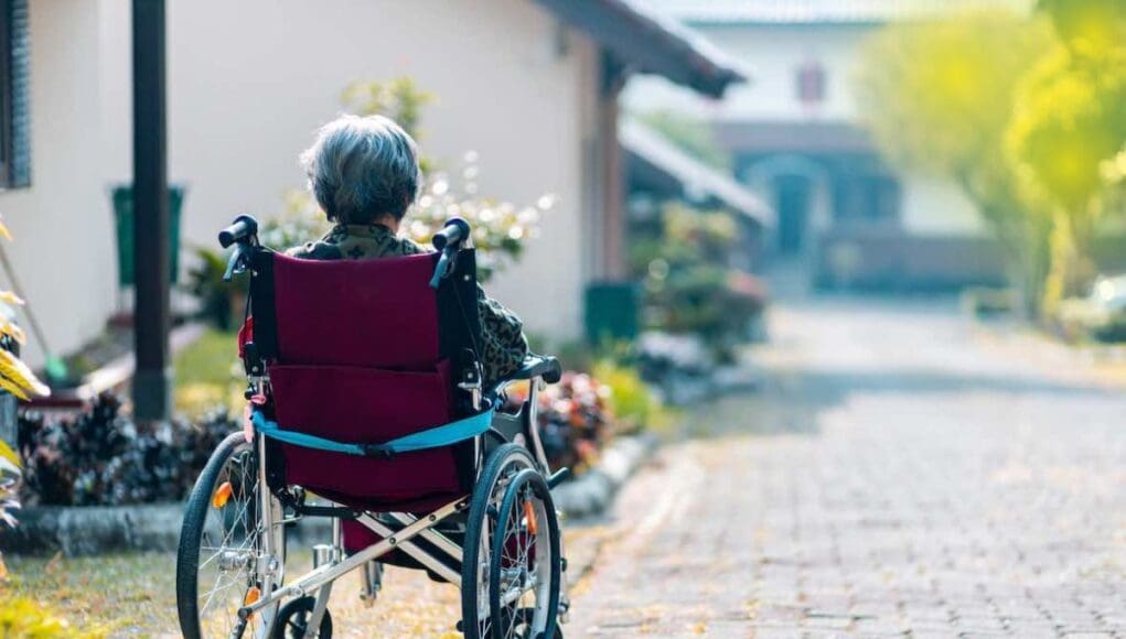 Dementia and Dysphagia Woman Sitting in Wheelchair at a nursing home